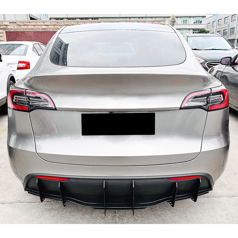 Achterbumperlamellen (Blades/Diffusor)  Tesla Model Y 2019- (Glanzend Zwart ABS)